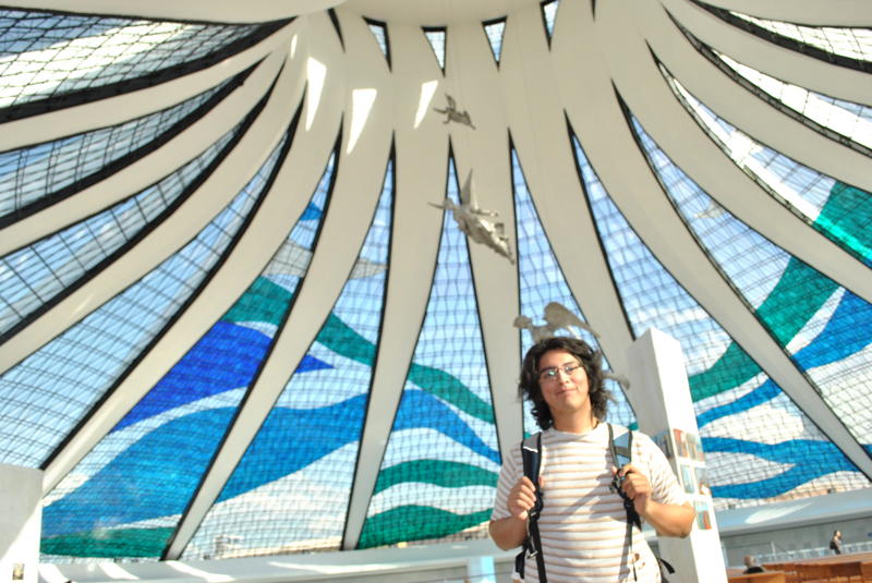 Kristopher Fortin stands inside architect Oscar Niemeyer’s Cathedral of Brasilia